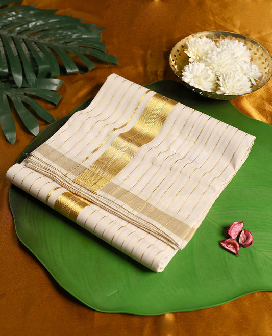 Ivory pure handloom soft cotton double dhoti accentuated with fine golden zari stripes and a broad zari border, blending comfort with traditional elegance, ideal for weddings, rituals, and festive occasions.