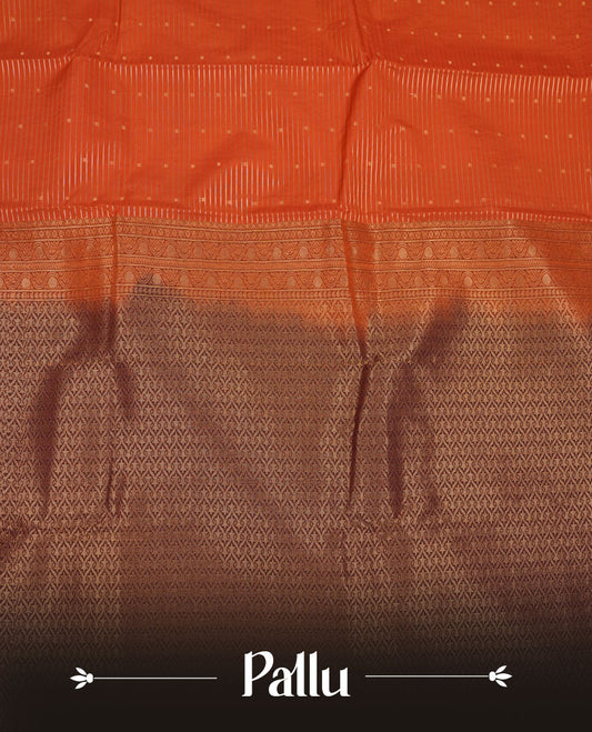 Rust orange colour semi silk saree featuring gold zari stripes small motifs on body highlighting contrast dark chocolate gold zari floral chakra border , paired with matching blouse