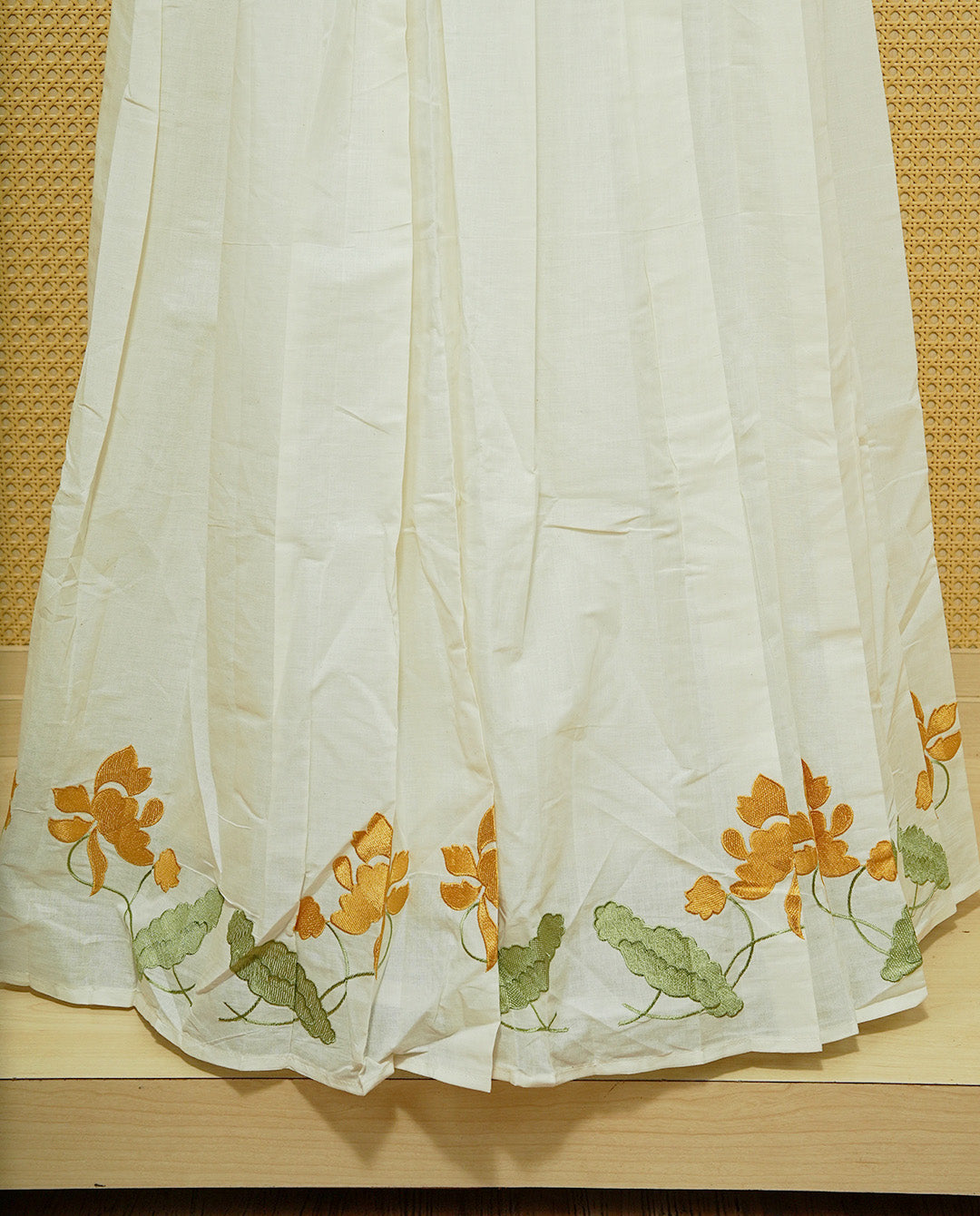Cream colour cotton Stitched Skirt With Mustard colour floral & Leaf kodi thread pattern border.