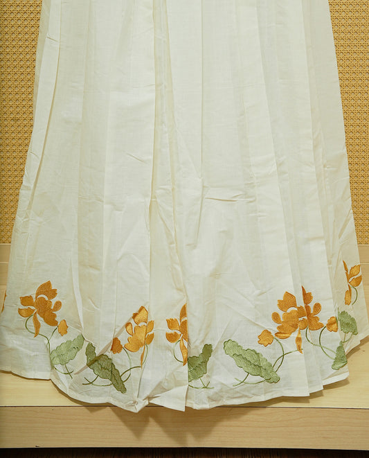 Cream colour cotton Stitched Skirt With Mustard colour floral & Leaf kodi thread pattern border.
