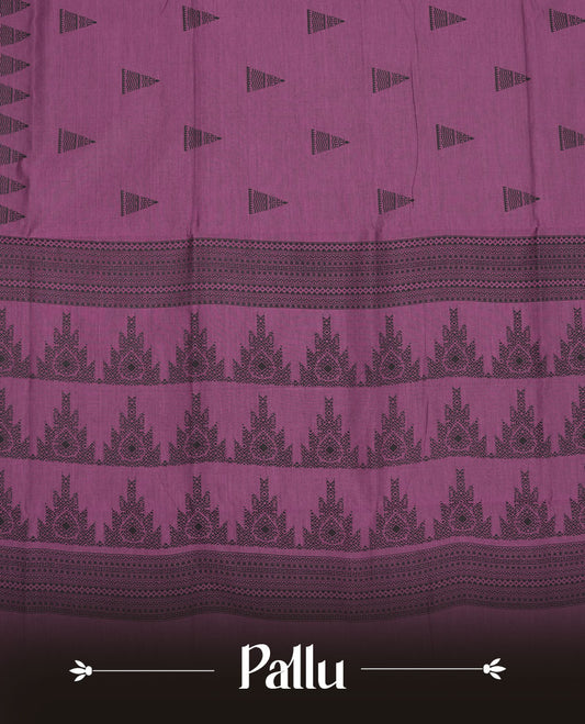 Purple colour poly cotton saree with black temple motifs on the body, paired with a matching with black woven traditional border, and a coordinated all‑over geometric printed blouse piece.