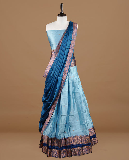 Aqua colour semi stitched Half saree featuring contrast Dark teal colour with antique zari traditional border skirt, paired with matching zari border dupatta, unstitched blouse piece