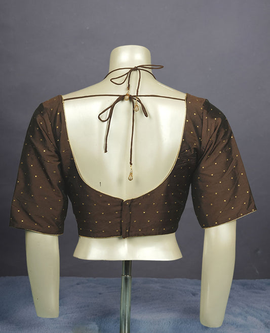 Taupe brown colour padded blouse with gold polka dots, V neckline, elbow sleeves, and deep tie-up back.
