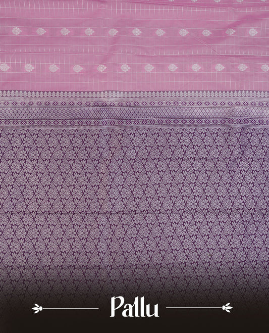 Lavender colour semi silk saree highlighting silver zari box pattern and motifs across body, featuring contrast silver colour border with gold zari pattern, comes with matching blouse .