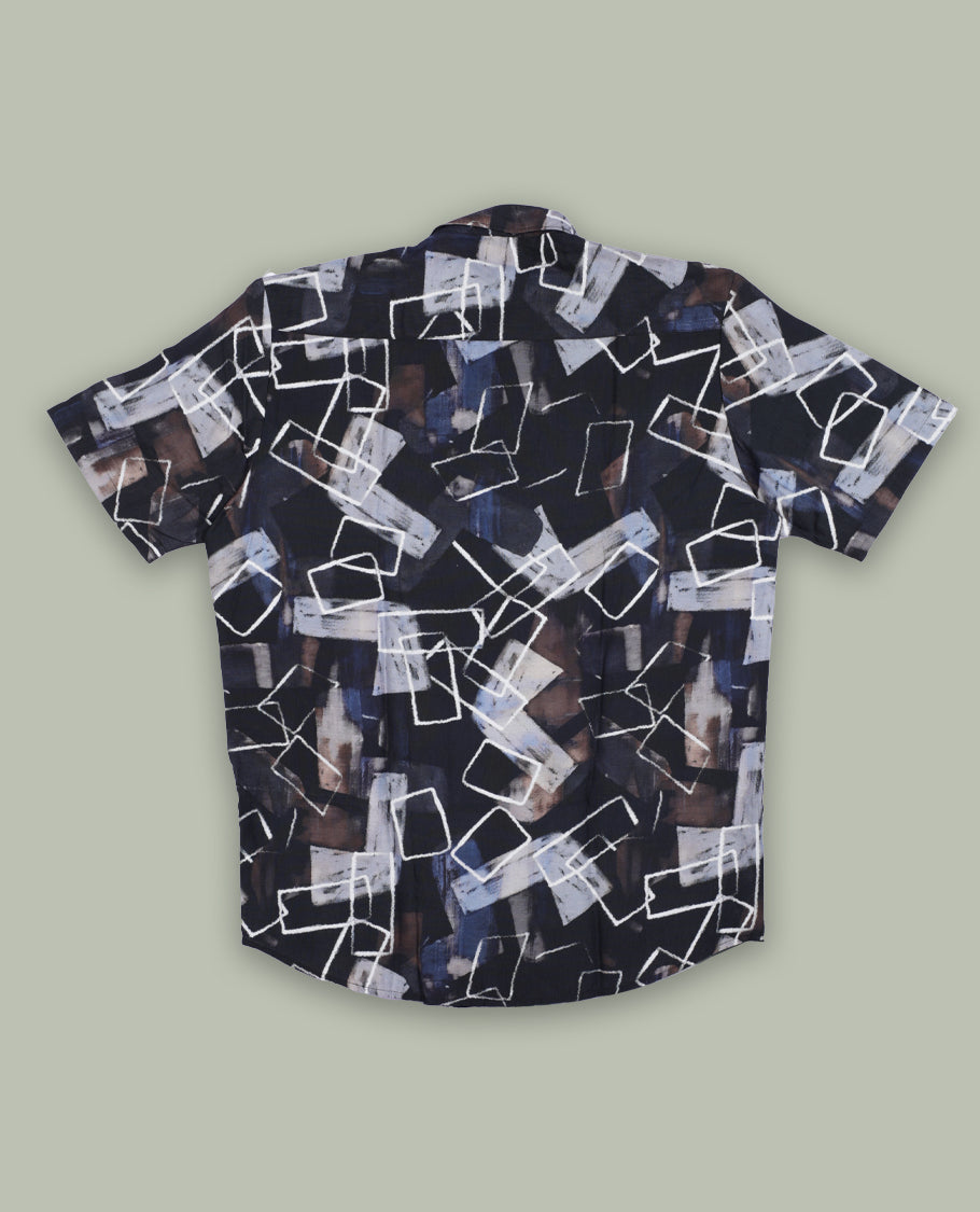 Deep green colour shirt features an abstract geometric print in white, grey, brown, and blue tones & Designed with short sleeves and a button down front,it blends contemporary style with subtle detailing.