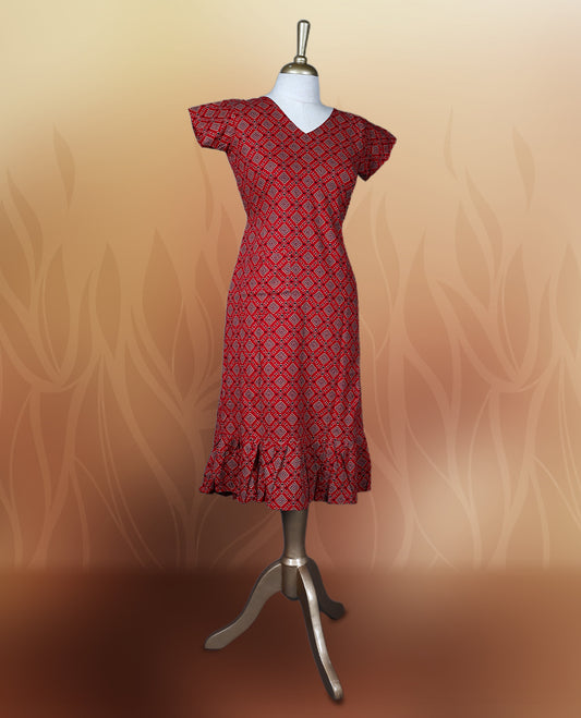 Red colour nightwear with a flattering V neck, short sleeves, and a geometric print & Features a fitted silhouette with a flared hem, Perfect for casual outings or festive occasions.