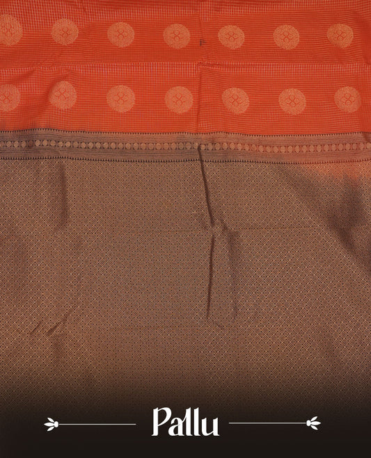 Dark Rust orange colour semi silk saree featuring gold zari checks with floral motifs on body highlighting contrast dark chocolate gold zari small mango border , paired with matching blouse