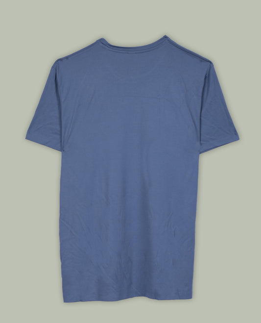 Greyish blue colour T shirt featuring a multicolour graphic print & designed with a classic round neck and short sleeves,made from soft breathable fabric for a comfortable and stylish everyday look.