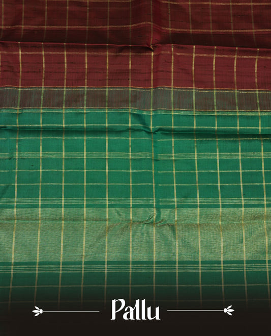 Maroon colour pure traditional Kancheepuram silk saree adorned with an elegant zari check pattern across the body, complemented by a contrast zari woven border, paired with a matching blouse piece.