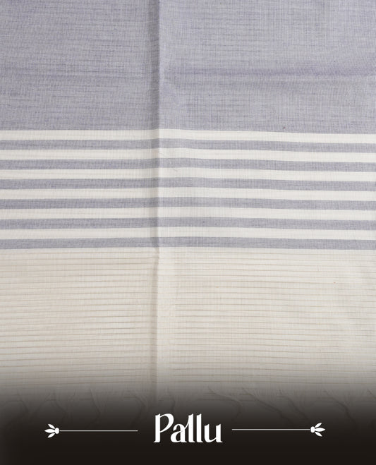 White colour chettinad cotton saree Featuring Gold zari strips on body, complemented by contrast Blue colour with zari border, comes with matching blouse piece.