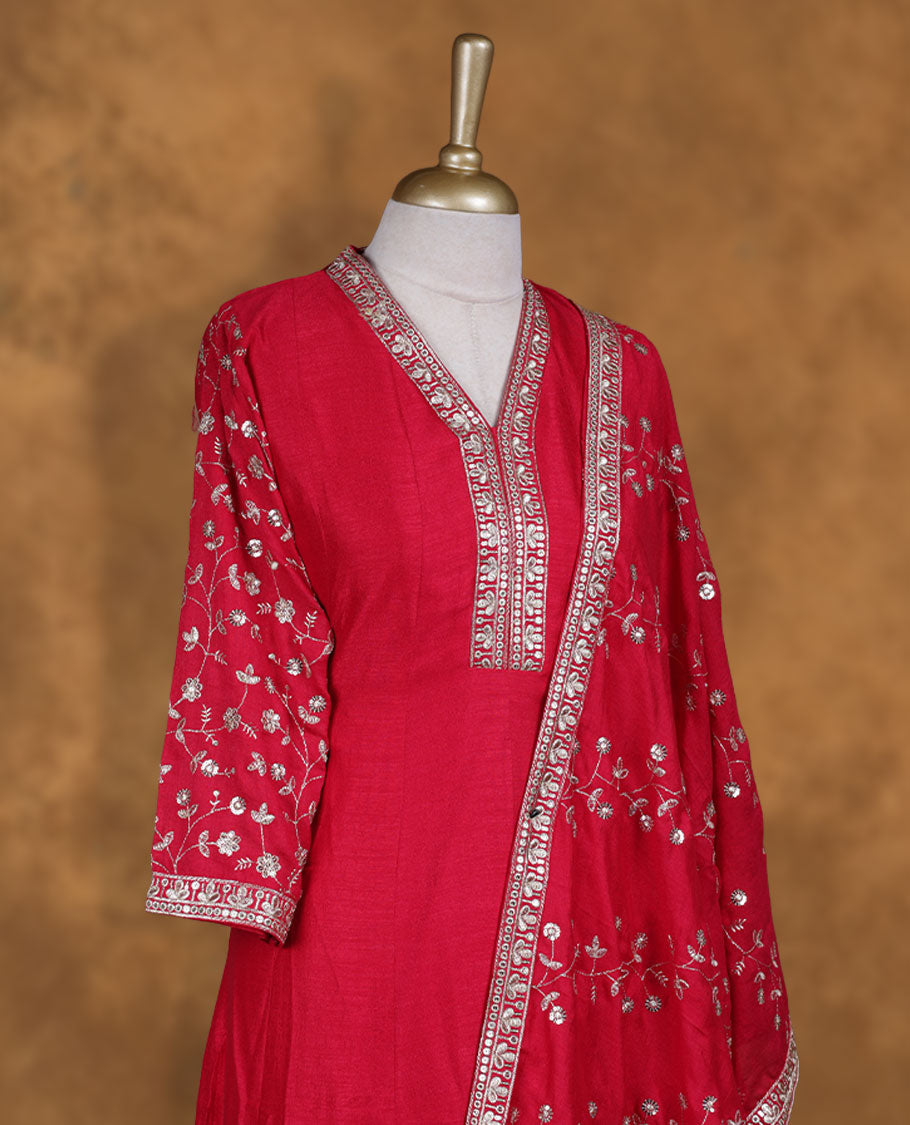 Red colour churidar set featuring thread and embroidered and beats pattern neckline, sleeves, and thread embroidery on body , Paired with a matching dupatta