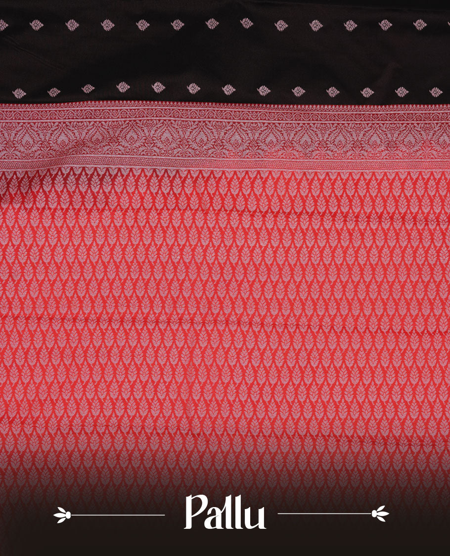 Black colour soft silk sareee featuring gold zari motifs on body, complemented by contrast Red colour with zari border, paired with matching blouse piece.