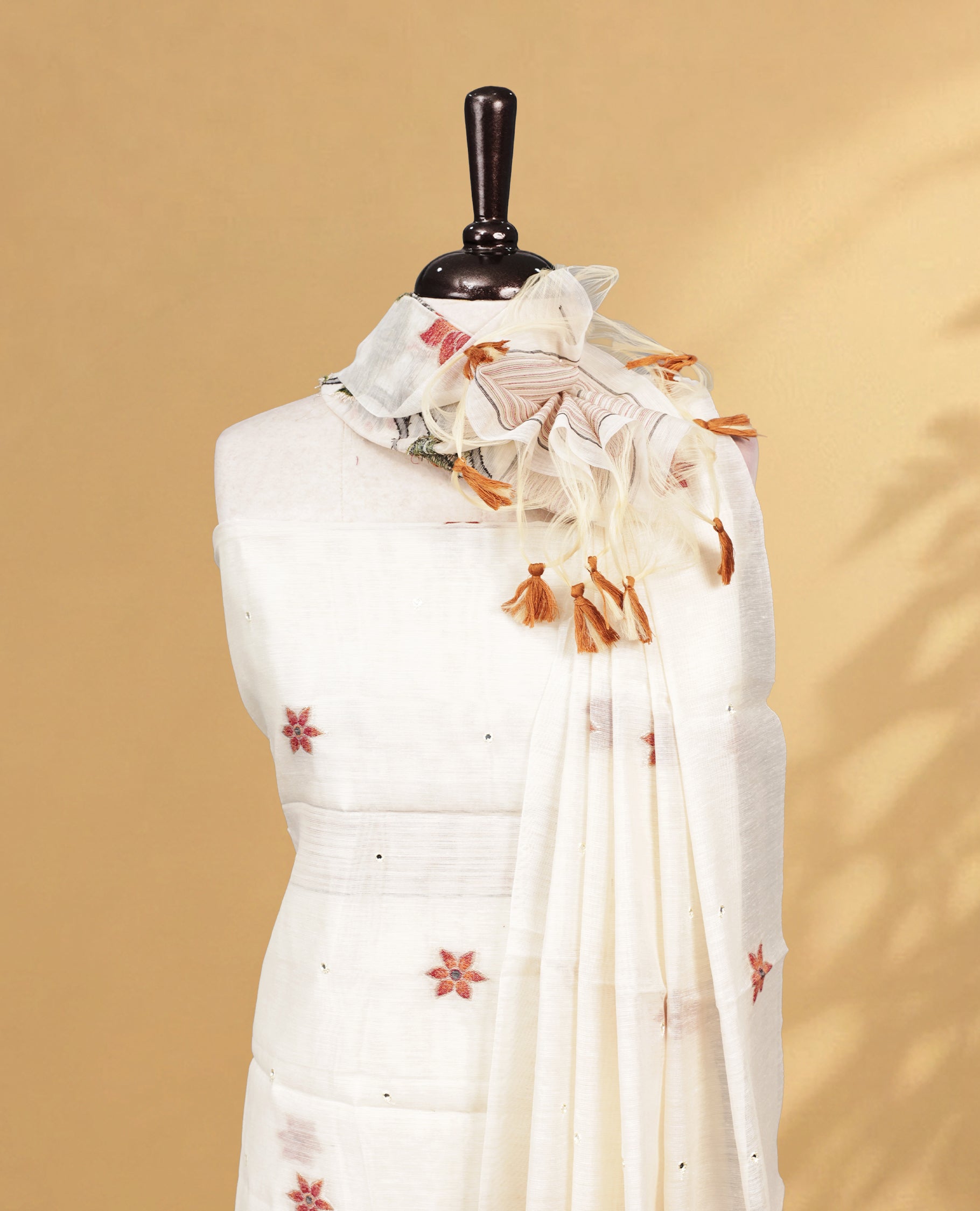 Off white Salwar material Featuring Motifs on body, zari border, paired with matching bottom, Floral Patterned Dupatta.