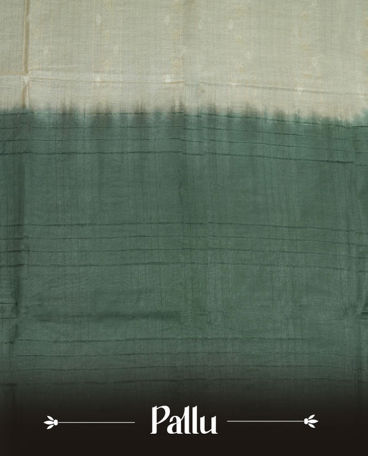 Cream & Green dye pattern colour semi jute saree highlighting white stripped body, without border and paired with matching blouse.