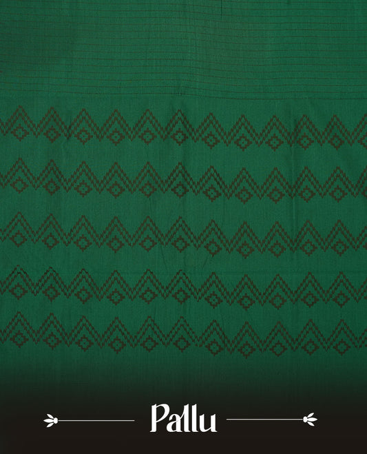 Dark Green colour poly cotton saree with black vertical dotted line pattern on the body, paired with a matching pallu featuring black zigzag geometric border, and a coordinated all‑over black stylised fleur‑de‑lis printed blouse piece.
