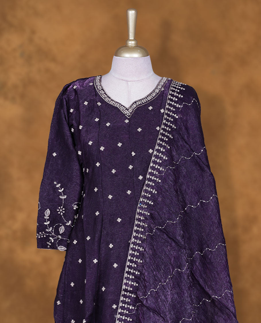 Dark Purple colour churidar set featuring thread and embroidered and beats pattern neckline, sleeves, and thread embroidery on body , Paired with a matching dupatta