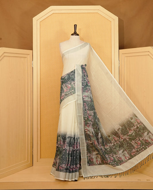 Off white Semi Linen Saree featuring One side Grey Indian Cultural Painting print, silver tissue border, comes with Matching blouse piece with same unique Pattern.