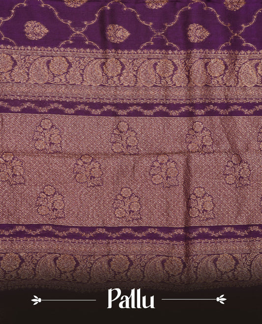 Grape purple colour semi Banaras saree with gold zari buta motifs, finished with a traditional gold zari border and pallu, paired with a matching blouse.