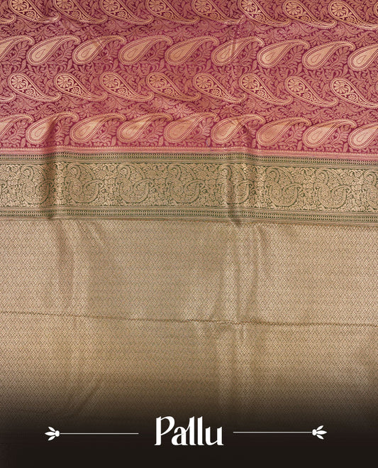 Purple colour semi silk brocade saree featuring intricate Gold Floral kodi & leaf patterns across the body, complemented by a contrast Green colour woven border and pallu, paired with a matching blouse.