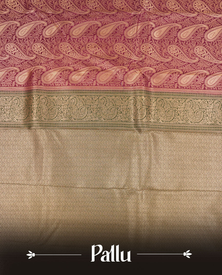 Purple colour semi silk brocade saree featuring intricate Gold Floral kodi & leaf patterns across the body, complemented by a contrast Green colour woven border and pallu, paired with a matching blouse.