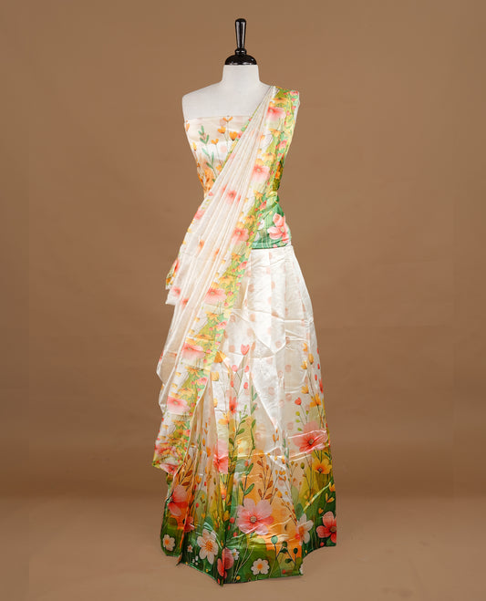 Off white colour semi stitched half saree featuring elegant multicolour floral prints, paired with a vibrant floral border and matching printed dupatta ,paired with matching blouse piece.
