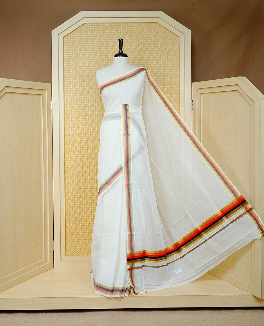 Cream colour Cotton kerala saree featuring Classy Plain body, complemented by Gold with red & black zari border & Pallu, paired with matching blouse piece.