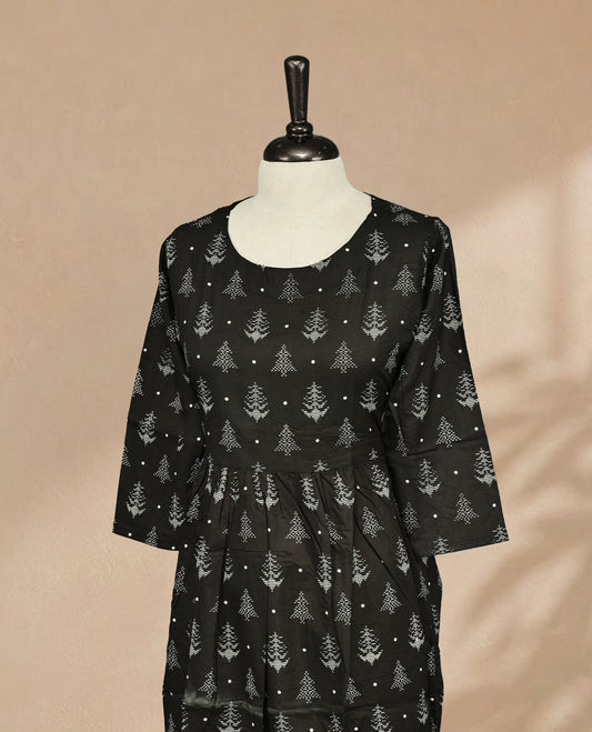 Black Kurti featuring White Digital prints across the body, a Round neckline and 3/4 sleeves with a matching design.