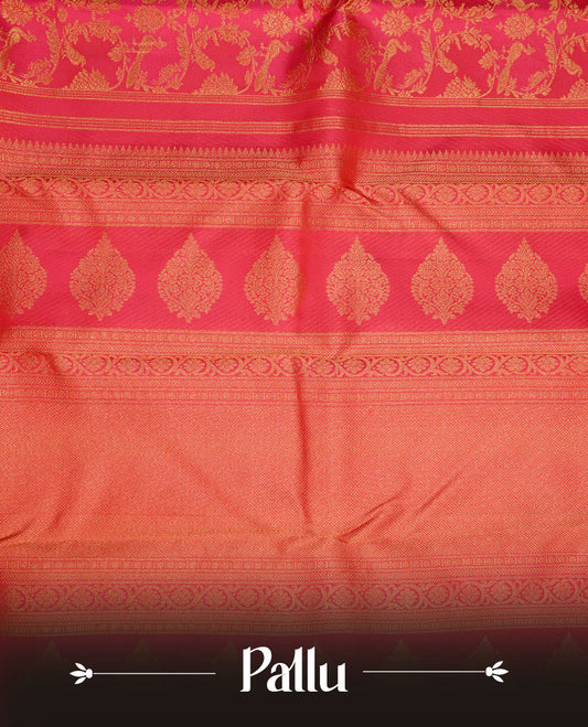 Rani pink colour kancheepuram silk saree featuring gold zari pattern across body, complemented by selfcolour border traditional zari border, paired with matching blouse piece.