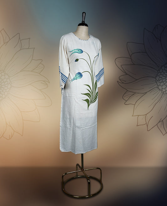 Off white colour kurthi with elegant pastel blue floral prints and leafy patterns on the front, accented by striped detailing on the sleeves, Perfect for a stylish yet comfortable casual or semi-formal look.