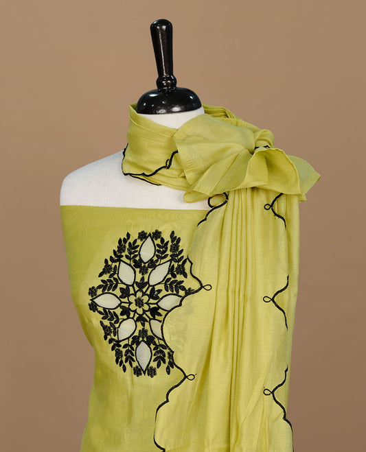 Lemon colour churidari material featuring black thread pattern on body, paired with matching bottom and dupatta.