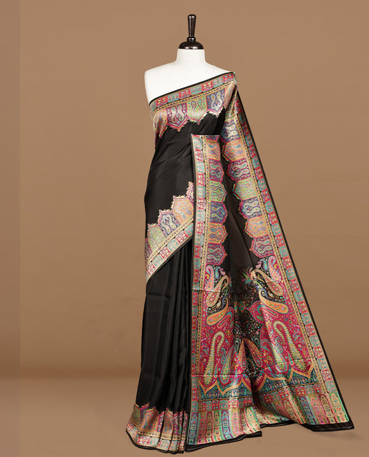 Black colour pashmina silk saree feature Elegant plain body, multi colour pattern on self colour border, paired with matching unstitched bluse