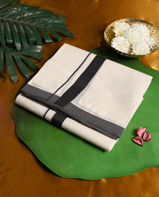 Traditional off white colour pure cotton dhoti featuring a bold black border, combining simplicity with a contemporary touch, making it a perfect choice for temple visits, cultural functions, and festive occasions.