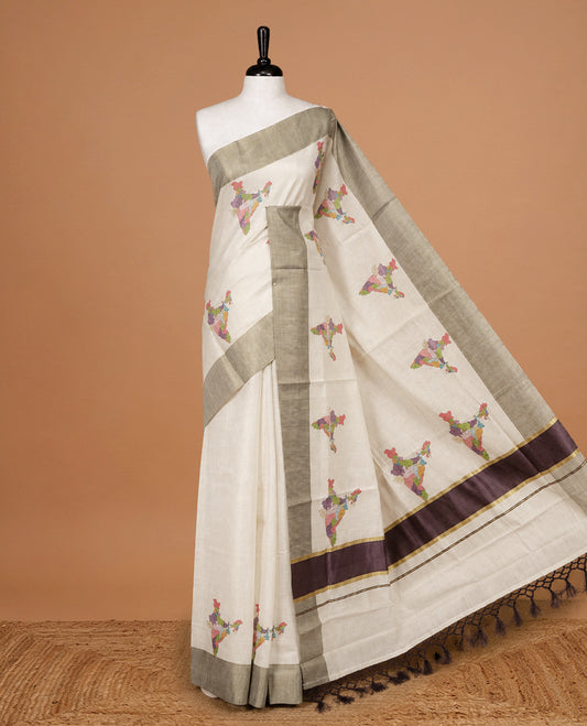 Cream Colour Kerala Saree Featuring  Plain Body ,Complemented By A Burgundy Zari With Indian Map Border ,Enhance By A  Gold Zari & Burgundy Pallu ,Paired With A Matching Blouse Piece.