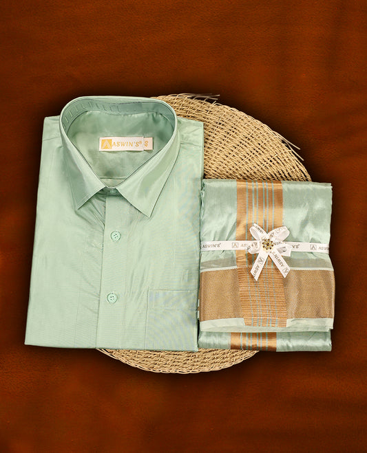 Pista green colour Aswin's wedding set featuring a shiny silk finish full sleeve shirt, paired with a matching pista green dhoti adorned with a rich golden zari border, perfect for weddings and festive occasions.