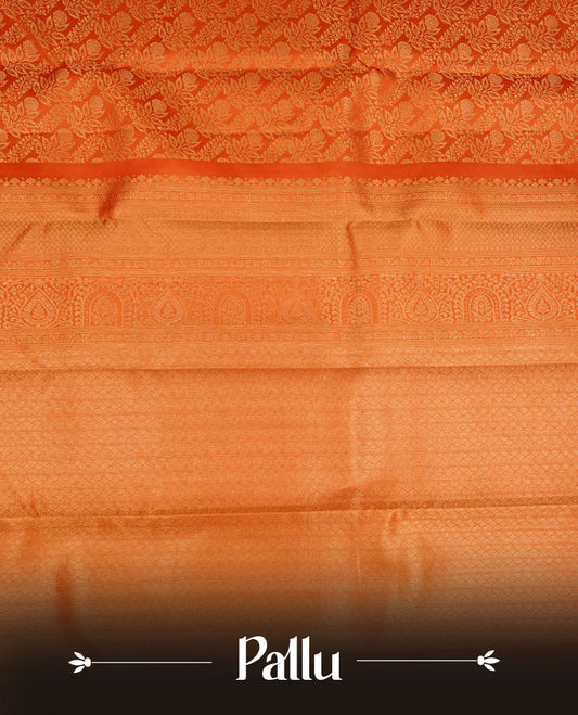 Orange colour kancheepuram silk saree featuring gold zari pattern across body, complemented by selfcolour border traditional zari border, paired with matching blouse piece.