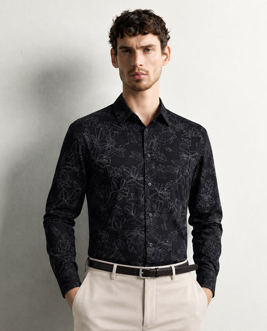 Black colour shirt with white pattern on body, Full sleeve.