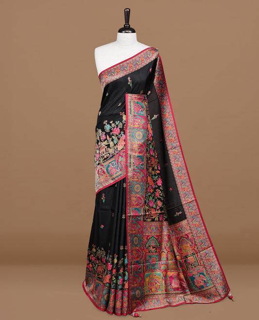 Black Pashmina silk saree featuring floral Pattern body, complemented by red border with multi colour bird motifs, complete with matching blouse piece.
