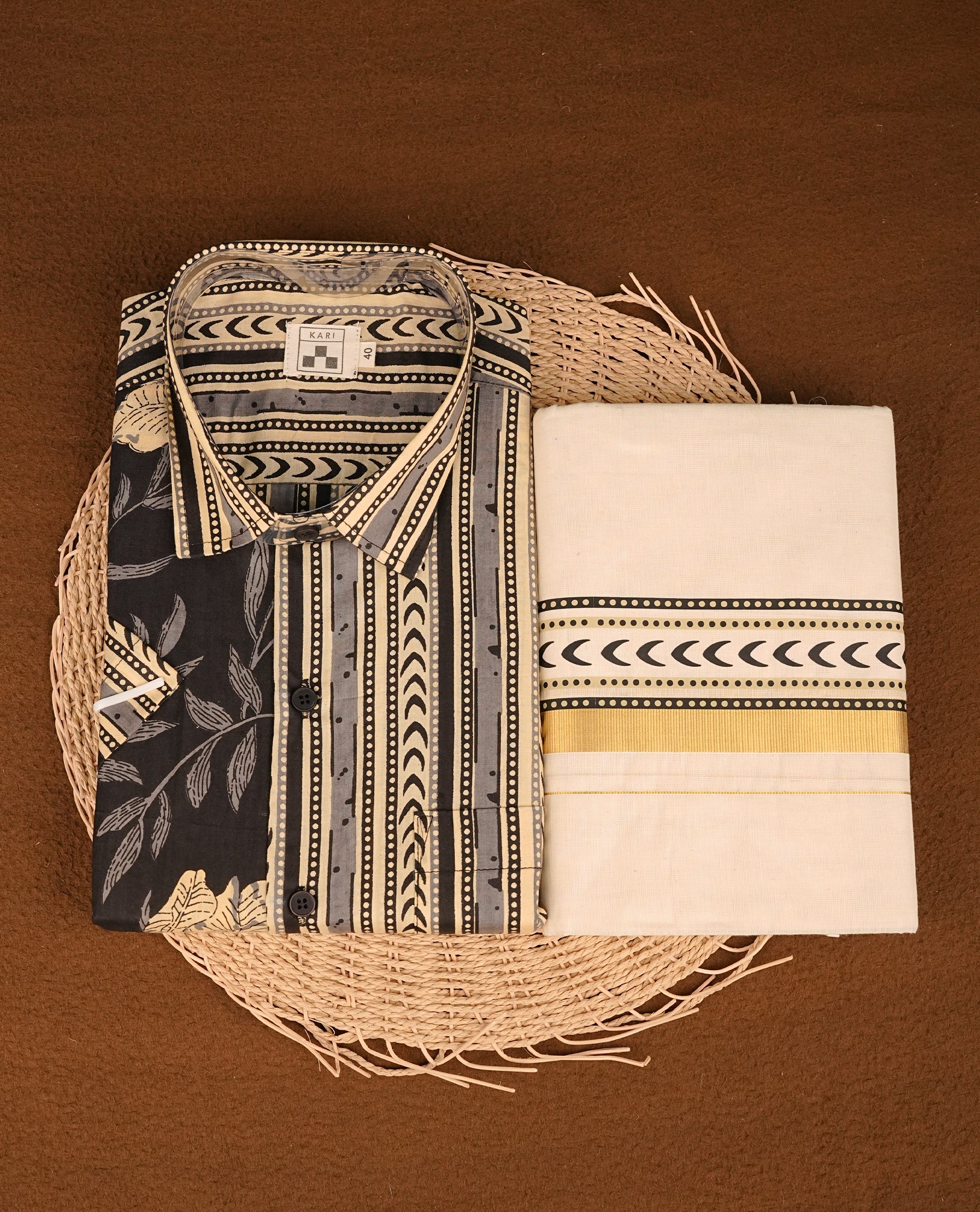 Grey & Cream colour shirt featuring Strips Pattern printed body, paired with cream colour double dhoti featuring gold zari with printed border.