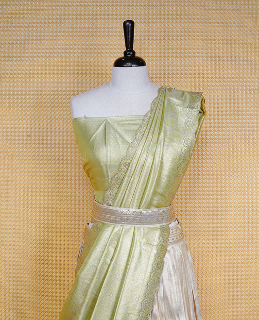 Light gold & Light Green Semi Stitched Dhavani Set Light Gold Skirt With Floral Pattern & Stone Worked Border, Paired with Unstitched Blouse, Elegant Dupatta For Prefect look.