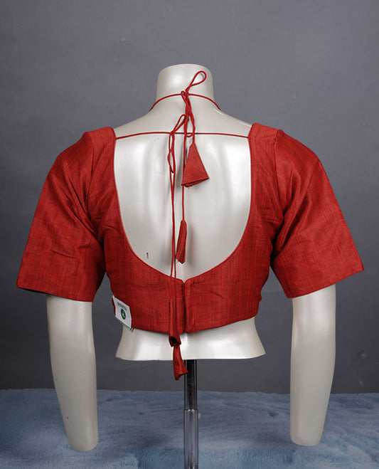 Red colour colour silk padded readymade blouse with elbow-length sleeves, a V-neck front, and a deep U-back with tie-up dori.