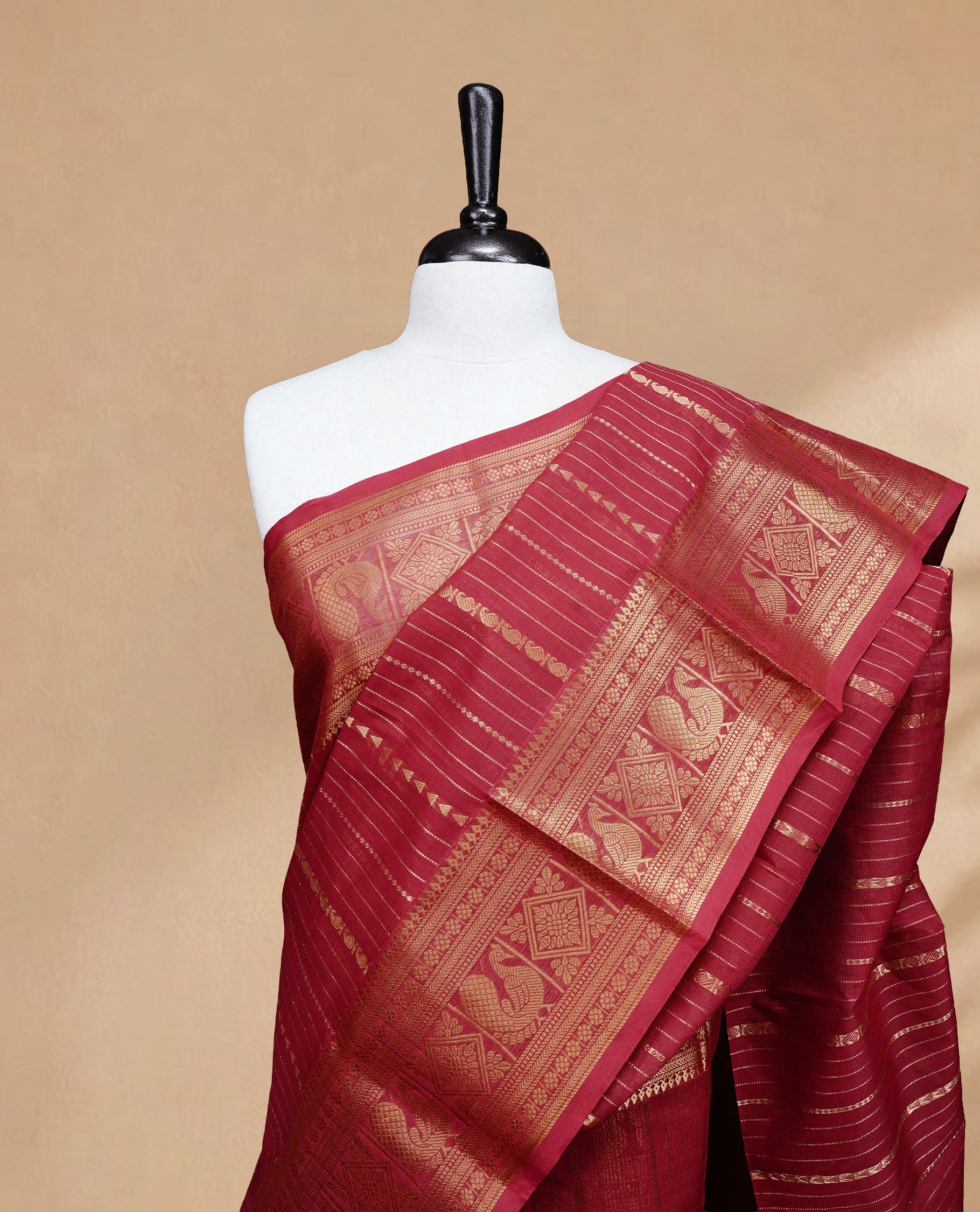 Red colour Chettinad cotton saree featuring Gold zari stripes on body, complemented by Self colour with Gold zari border, paired with matching blouse piece.