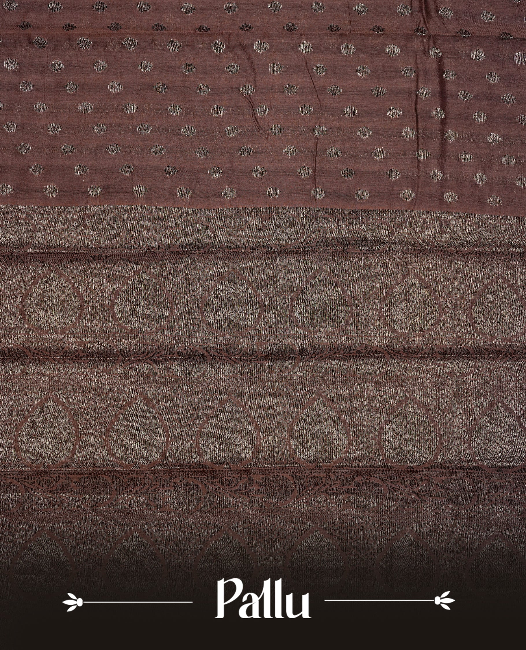 Copper brown colour semi tussar silk saree featuring elegant Antique zari motifs across the body, designed with a subtle borderless zari finish for a sophisticated traditional look. Paired with a matching blouse piece.