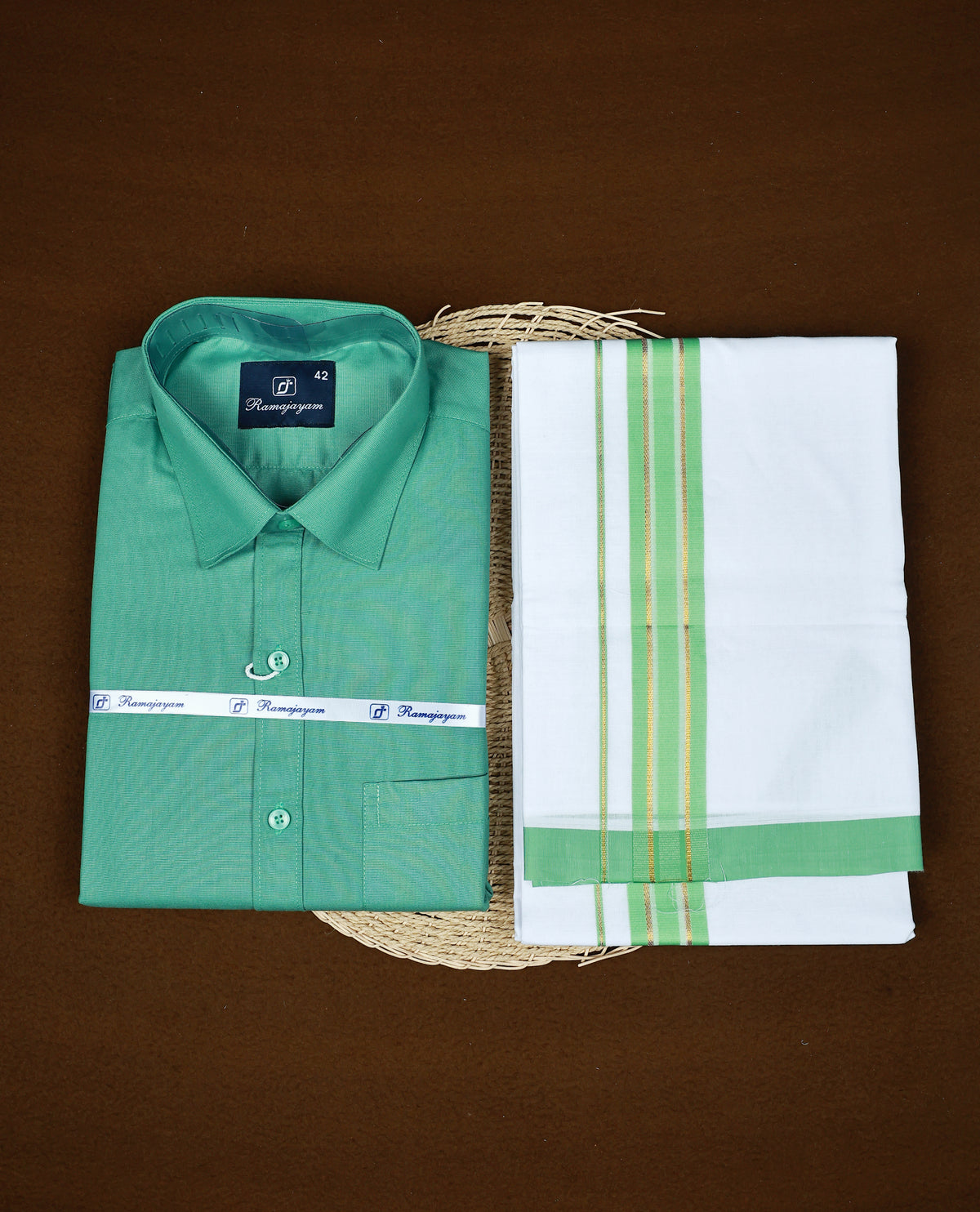 Green colour RAMAJAYAM shirt paired with a matching dhoti, finishing with a Green & gold kara