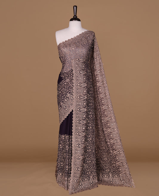 Maroon colour georgette designer saree featuring Gold thread floral pattern on body highlighting with stone and scalp border, paired with matching blouse piece.