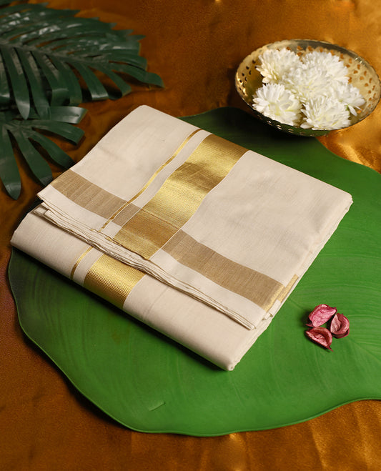 Elegant ivory white pure handloom cotton dhoti, featuring a rich golden zari border, crafted for traditional charm and everyday comfort.