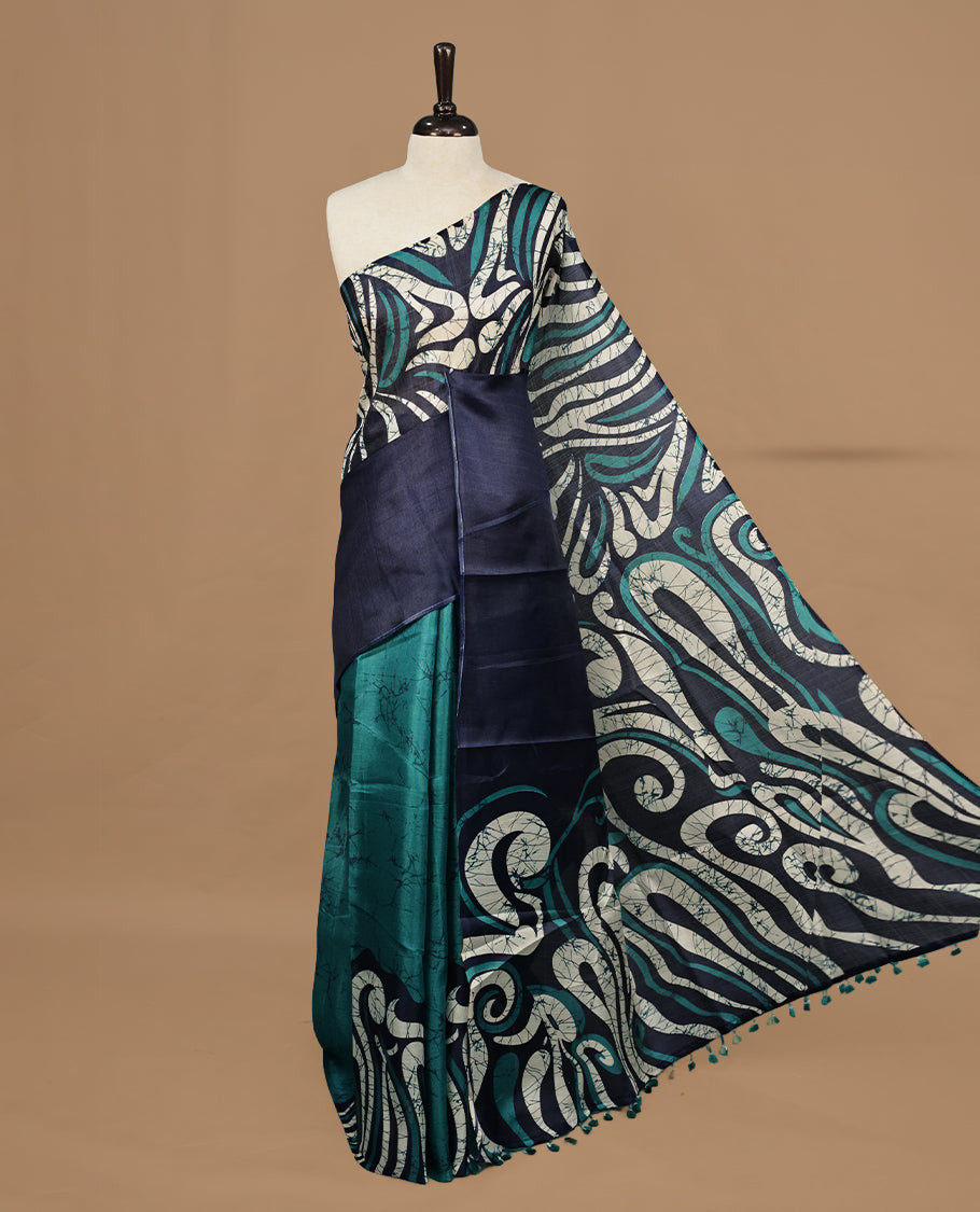 Peacock With Navy Blue Colour Khadi silk saree Featuring Abstract Print Patterned & Curved Wave Like Line Detailed Body, Paired with matching blouse piece.