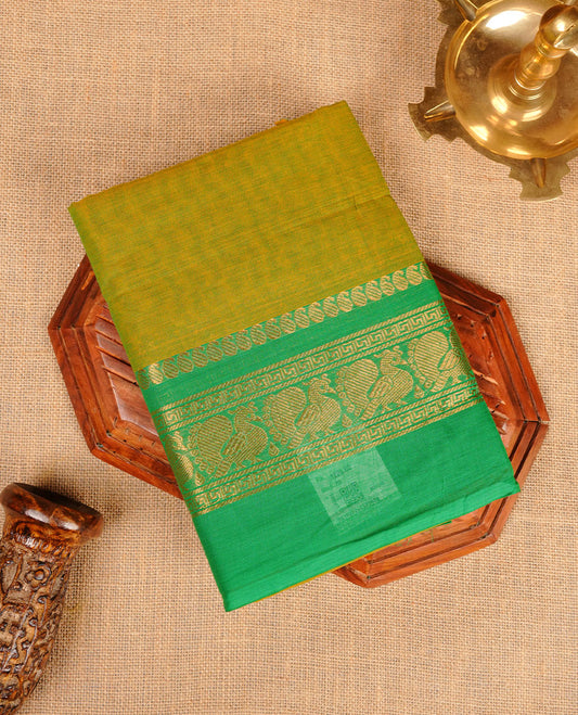 Lemon colour chettinad cotton saree featuring plain body, contrast Green colour with traditional gold zari border paired with matching blouse.