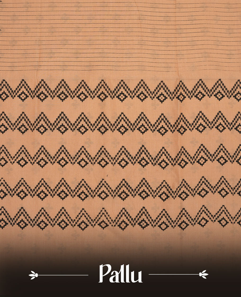 Pastel Orange colour poly cotton saree with black vertical dotted line pattern on the body, paired with a matching pallu featuring black zigzag geometric border, and a coordinated all‑over black stylised fleur‑de‑lis printed blouse piece.