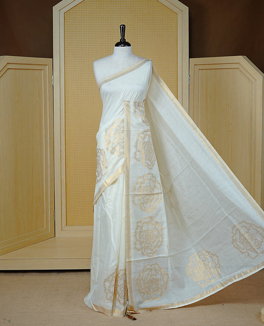 Cream Colour Organza Kerala Saree Featuring A Plain Body, Enriched By A Light Gold Zari Rose Patterned Border, Paired With A Matching Blouse Piece.