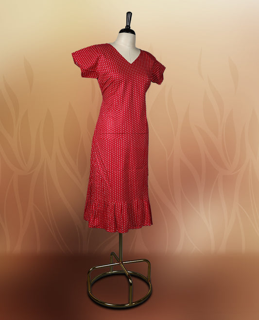Red colour nightwear with tiny off white colour circles, V neckline, and flutter sleeves & The flared hem with pleats adds a chic touch, Ideal for casual wear, office looks, or relaxed outings with a stylish twist.